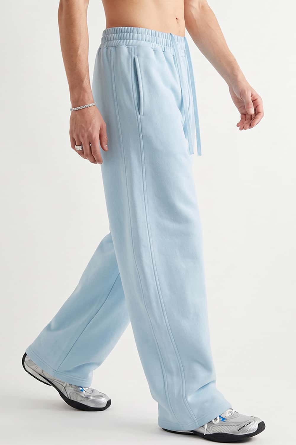 Fleece-Lined Wide-Leg Drawstring Trousers in Baby Blue - three-quarter front modeled view