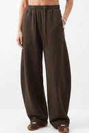 Fleece-Lined Wide-Leg Drawstring Trousers in Brown - full-length front modeled view