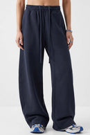 Fleece-Lined Wide-Leg Drawstring Trousers in Midnight Blue - full-length front modeled view