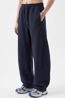 Fleece-Lined Wide-Leg Drawstring Trousers in Midnight Blue - front modeled view