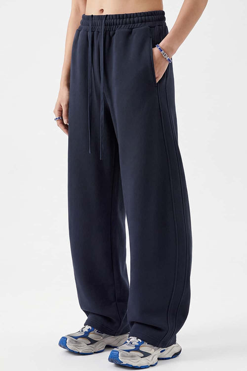 Fleece-Lined Wide-Leg Drawstring Trousers in Midnight Blue - front modeled view