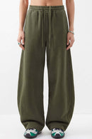 Fleece-Lined Wide-Leg Drawstring Trousers in Military Green - full-length front modeled view