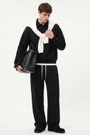 Heavyweight Long-Sleeve Polo Shirt in Black - full-length front modeled view