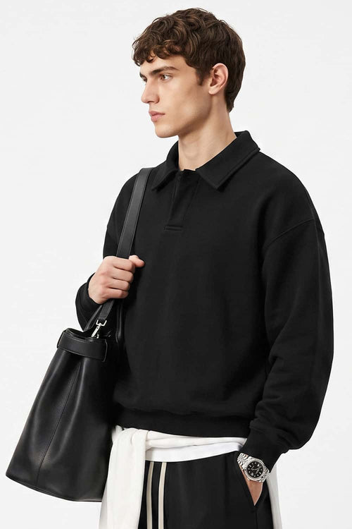 Heavyweight Long-Sleeve Polo Shirt in Black - side modeled view