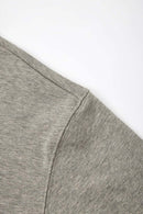 Heavyweight Long-Sleeve Polo Shirt in Oat Gray - side modeled view