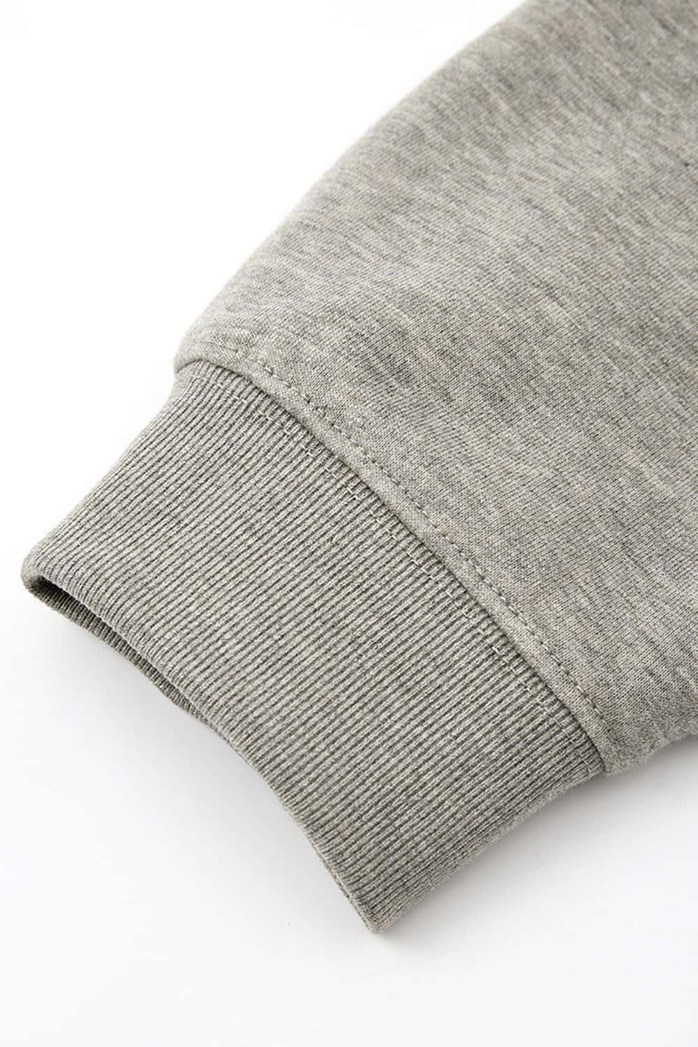 Heavyweight Long-Sleeve Polo Shirt in Oat Gray - product detail close-up