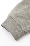 Heavyweight Long-Sleeve Polo Shirt in Oat Gray - product detail close-up