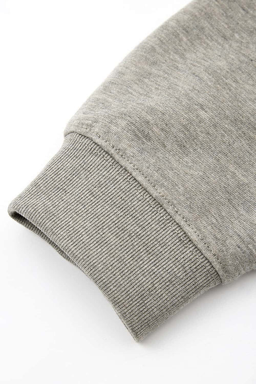 Heavyweight Long-Sleeve Polo Shirt in Oat Gray - product detail close-up