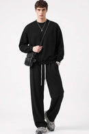 Heavyweight Drop-Shoulder Sweatshirt in Black - full-length front modeled view