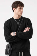 Heavyweight Drop-Shoulder Sweatshirt in Black - front modeled view