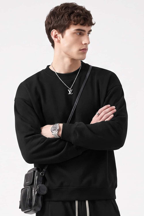 Heavyweight Drop-Shoulder Sweatshirt in Black - front modeled view