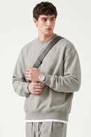 Heavyweight Drop-Shoulder Sweatshirt in Oat Gray - front modeled view
