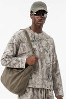 Botanical-Print Long-Sleeve Top in Gray Camel - front modeled view