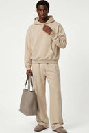 Relaxed Pullover Hoodie in Apricot - full-length front modeled view