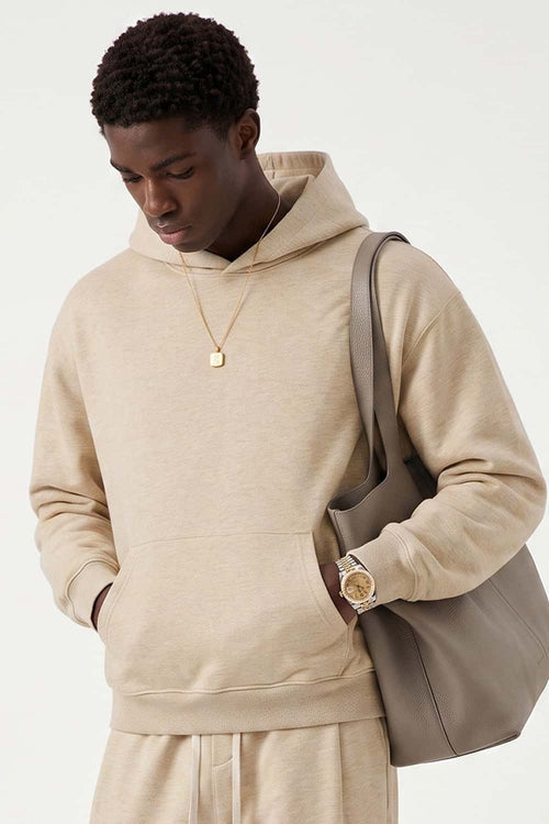 Relaxed Pullover Hoodie in Apricot - three-quarter front modeled view