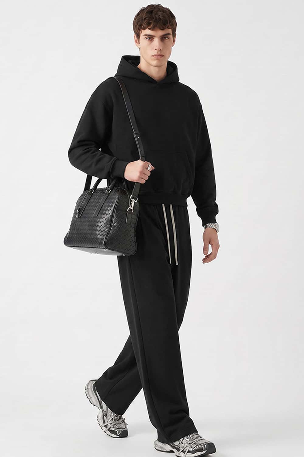 Relaxed Pullover Hoodie in Black - full-length front modeled view