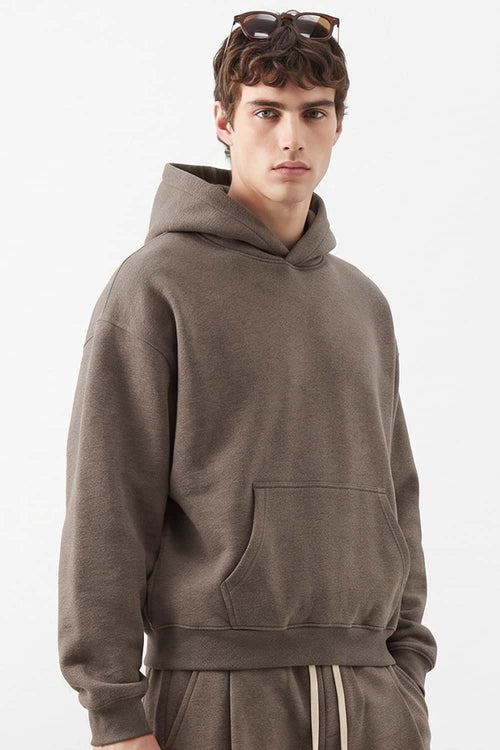 Relaxed Pullover Hoodie in Coffee - three-quarter front modeled view