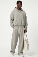 Relaxed Pullover Hoodie in Oat Gray - full-length front modeled view