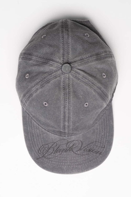 Six-Panel Cotton Baseball Cap with Cursive Artwork on the Brim in Light Gray - flat lay product view