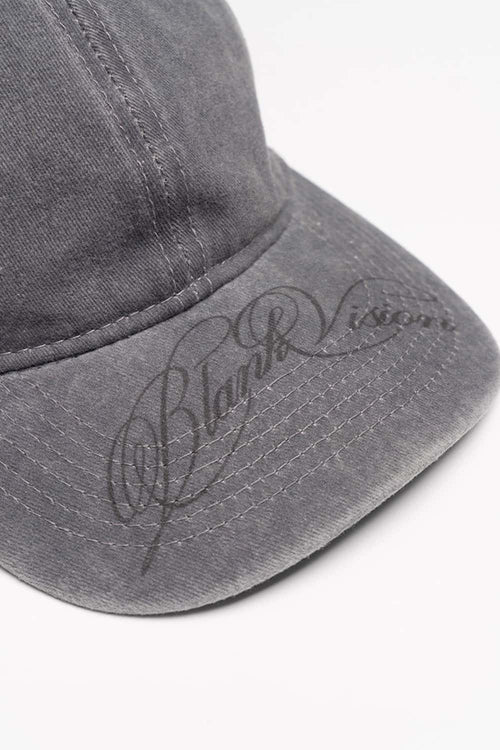 Six-Panel Cotton Baseball Cap with Cursive Artwork on the Brim in Light Gray - product detail close-up