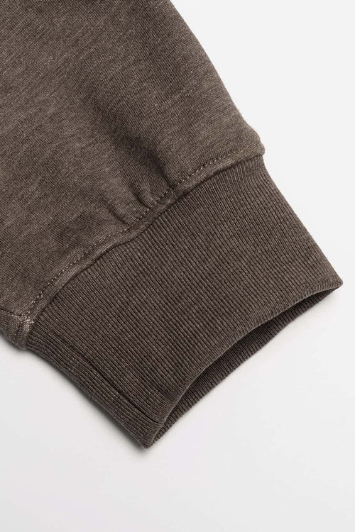 Relaxed Pullover Hoodie with Embroidered Emblem in Coffee - cuff detail