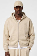 Heavyweight Two-Way Zip Hoodie with Embroidered Emblem in Apricot - front modeled close-up