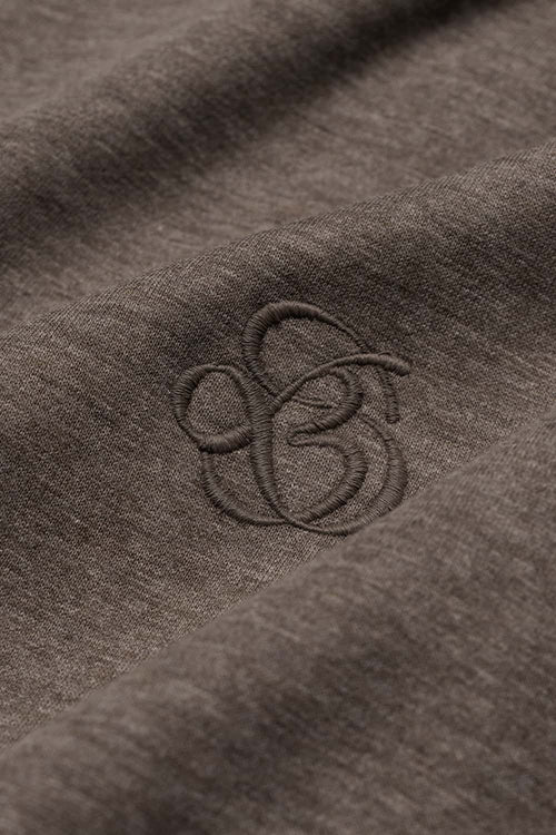 Heavyweight Two-Way Zip Hoodie with Embroidered Emblem in Coffee - graphic detail