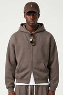 Heavyweight Two-Way Zip Hoodie with Embroidered Emblem in Coffee - front modeled close-up