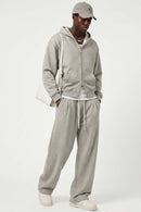 Heavyweight Two-Way Zip Hoodie with Embroidered Emblem in Oat Gray - full-length front modeled view