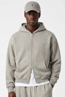 Heavyweight Two-Way Zip Hoodie with Embroidered Emblem in Oat Gray - front modeled close-up